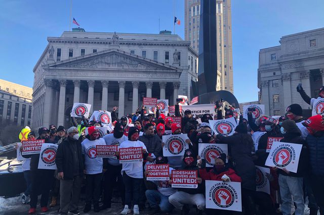 A photo of app-based drivers rallying for better working conditions